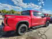 2022 Toyota Tundra Limited with VIN 5TFJA5DB2NX001546, listed as a Copart auction lot 84411785 with 32,693 mi miles and Salvage title. Bid and sale history available at DreamBid. Image 3.