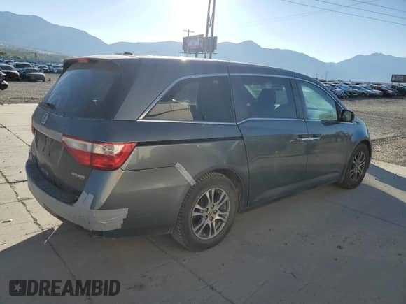 2013 Honda Odyssey EX-L z VIN 5FNRL5H65DB067849, wystawiony jako Copart lot #82080965 z przebiegiem 203 209 mil mil oraz Szkoda całkowita • Salvage title. Historia ofert i sprzedaży dostępna na DreamBid. Obrazek 3.