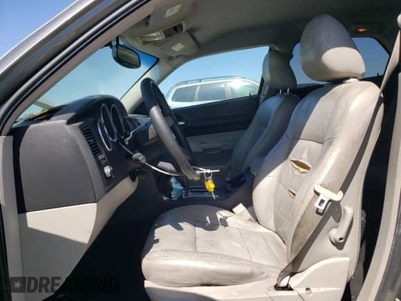 2005 Dodge Magnum SE with VIN 2D4FV48V55H158780, listed as a Copart auction lot 61124775 with 233,129 mi miles and Salvage title. Bid and sale history available at DreamBid. Image 7.