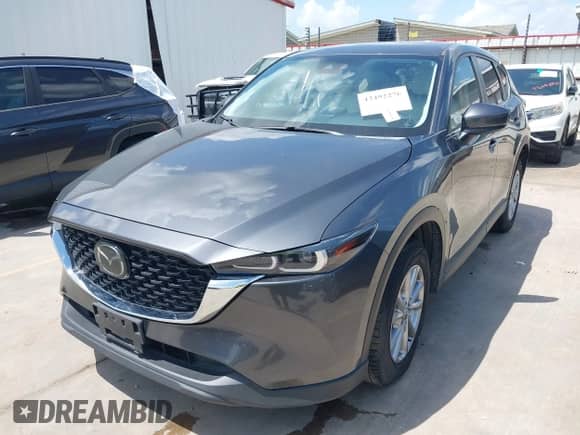 2023 Mazda CX-5 S Preferred z VIN JM3KFBCMXP0124912, wystawiony jako IAAI lot #42492270 z przebiegiem 44 510 mil mil oraz . Historia ofert i sprzedaży dostępna na DreamBid. Obrazek 2.