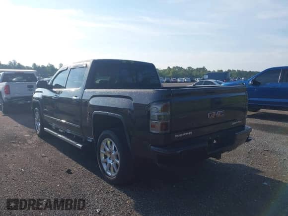 2015 GMC Sierra 1500 Denali with VIN 3GTU2WEC6FG333227, listed as a IAAI auction lot 43073184 with 157,661 mi miles and . Bid and sale history available at DreamBid. Image 3.