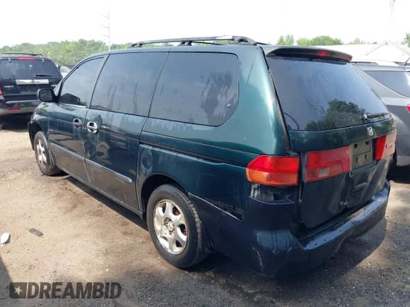 1999 Honda Odyssey LX with VIN 2HKRL1854XH507744, listed as a IAAI auction lot 42501838 with 283,556 mi miles and . Bid and sale history available at DreamBid. Image 3.