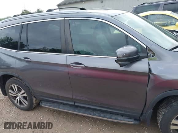 2016 Honda Pilot EX-L with VIN 5FNYF6H89GB005885, listed as a IAAI auction lot 42442688 with 173,204 mi miles and . Bid and sale history available at DreamBid. Image 14.