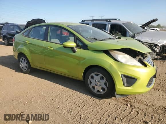 2011 Ford Fiesta SE с VIN 3FADP4BJXBM240012, выставлен на аукционе Copart как лот 71398335 с пробегом Не указан миль и Списание • Salvage title. История ставок и продаж доступна на DreamBid. Изображение 4.