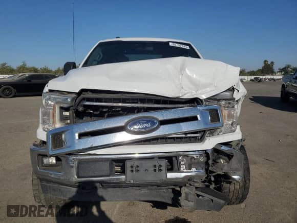 2018 Ford F-150 XLT z VIN 1FTEW1EG9JFA19483, wystawiony jako Copart lot #80747525 z przebiegiem 91 561 mil mil oraz Szkoda całkowita • Salvage title. Historia ofert i sprzedaży dostępna na DreamBid. Obrazek 5.