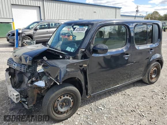 2010 Nissan Cube S with VIN JN8AZ2KR3AT170729, listed as a Copart auction lot 82282885 with 97,111 mi miles and Salvage title. Bid and sale history available at DreamBid. Image 1.
