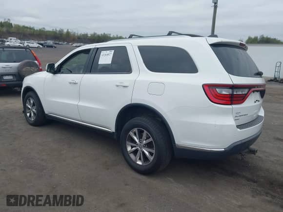 2016 Dodge Durango Limited with VIN 1C4RDJDGXGC353606, listed as a IAAI auction lot 43264827 with 188,125 mi miles and . Bid and sale history available at DreamBid. Image 3.