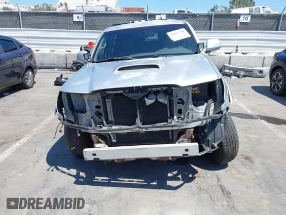 2005 Toyota Tacoma PreRunner with VIN 5TEKU72N65Z053095, listed as a IAAI auction lot 43017798 with 283,534 mi miles and . Bid and sale history available at DreamBid. Image 6.