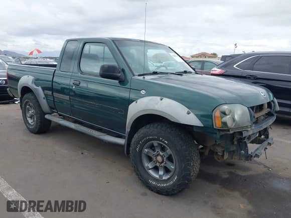 2002 Nissan Frontier XE with VIN 1N6ED26T82C309169, listed as a IAAI auction lot 42201511 with 214,243 mi miles and . Bid and sale history available at DreamBid. Image 1.