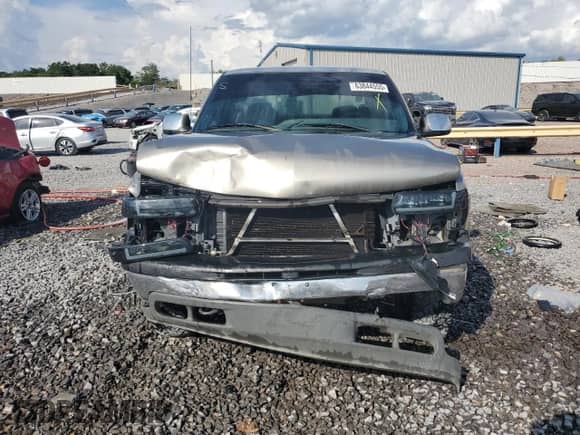 2000 Chevrolet Silverado 1500 LS with VIN 2GCEK19T1Y1280577, listed as a Copart auction lot 63844555 with 327,774 mi miles and Salvage title. Bid and sale history available at DreamBid. Image 5.