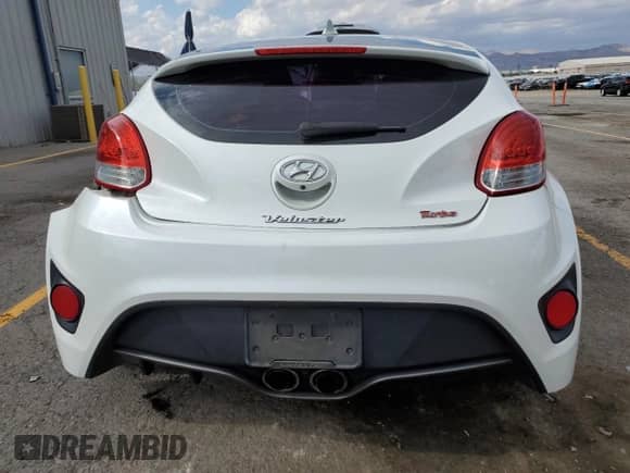 2014 Hyundai Veloster Turbo R-Spec с VIN KMHTC6AE1EU208532, выставлен на аукционе Copart как лот 70159995 с пробегом 75 844 миль миль и Списание • Salvage title. История ставок и продаж доступна на DreamBid. Изображение 6.