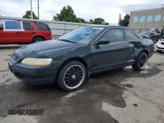 1999 Honda Accord EX with VIN 1HGCG2258XA021181, listed as a Copart auction lot 58598945 with 315,861 mi miles and Salvage title. Bid and sale history available at DreamBid. Image 1.