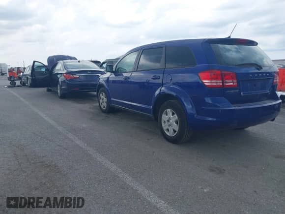 2012 Dodge Journey American Value with VIN 3C4PDCAB7CT276042, listed as a IAAI auction lot 42621991 with 238,478 mi miles and . Bid and sale history available at DreamBid. Image 3.