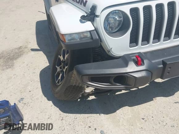 2021 Jeep Wrangler Unlimited Rubicon with VIN 1C4HJXFG5MW586842, listed as a IAAI auction lot 42186683 with 76,450 mi miles and . Bid and sale history available at DreamBid. Image 6.