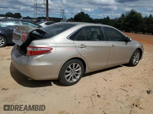 2015 Toyota Camry LE с VIN 4T1BD1FK3FU154193, выставлен на аукционе Copart как лот 85290175 с пробегом 138 034 миль миль и Списание • Salvage title. История ставок и продаж доступна на DreamBid. Изображение 3.