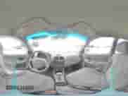 2005 Hyundai Accent GLS z VIN KMHCG45C75U639281, wystawiony jako Copart lot #54887095 z przebiegiem 136 090 mil mil oraz Szkoda całkowita • Salvage title. Historia ofert i sprzedaży dostępna na DreamBid. Obrazek 14.