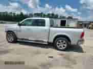 2014 Ram 1500 Laramie with VIN 1C6RR6NT0ES397960, listed as a Copart auction lot 61458895 with 148,298 mi miles and Salvage title. Bid and sale history available at DreamBid. Image 2.