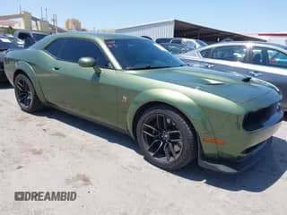 2022 Dodge Challenger R/T Scat Pack Widebody z VIN 2C3CDZFJ8NH177621, wystawiony jako IAAI lot #42358022 z przebiegiem 19 076 mil mil oraz . Historia ofert i sprzedaży dostępna na DreamBid. Obrazek 1.