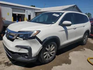 2019 Honda Pilot EX with VIN 5FNYF6H31KB081310, listed as a Copart auction lot 63064695 with 98,860 mi miles and Salvage title. Bid and sale history available at DreamBid. Image 1.
