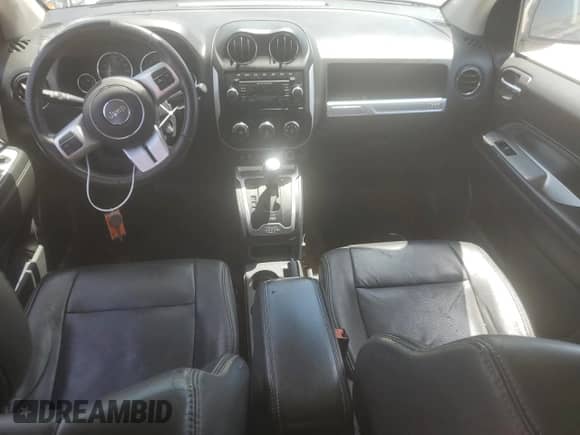 2015 Jeep Compass High Altitude with VIN 1C4NJCEA6FD171682, listed as a Copart auction lot 62288755 with 125,044 mi miles and Clean title. Bid and sale history available at DreamBid. Image 8.