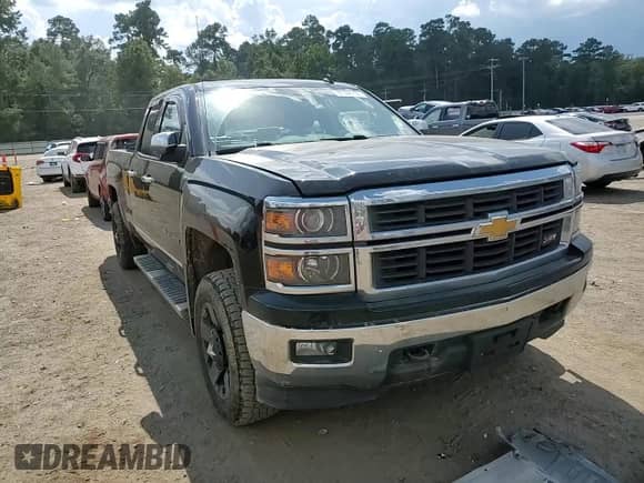 2014 Chevrolet Silverado 1500 LTZ z VIN 1GCVKSEC1EZ216747, wystawiony jako Copart lot #81556155 z przebiegiem 148 667 mil mil oraz Szkoda całkowita • Salvage title. Historia ofert i sprzedaży dostępna na DreamBid. Obrazek 13.