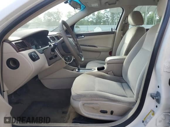 2006 Chevrolet Impala LT 3.9L with VIN 2G1WC581369259763, listed as a Copart auction lot 66530805 with 128,557 mi miles and Salvage title. Bid and sale history available at DreamBid. Image 7.