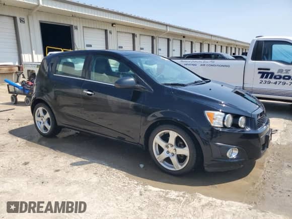 2016 Chevrolet Sonic LTZ with VIN 1G1JE6SB2G4163008, listed as a Copart auction lot 59600135 with 106,564 mi miles and Clean title. Bid and sale history available at DreamBid. Image 4.