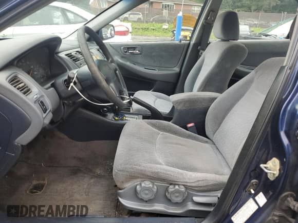 2001 Honda Accord LX z VIN 1HGCG564X1A062843, wystawiony jako Copart lot #80673095 z przebiegiem 240 783 mil mil oraz Szkoda całkowita • Salvage title. Historia ofert i sprzedaży dostępna na DreamBid. Obrazek 7.