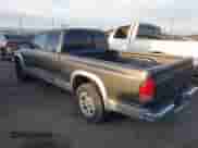 2002 Dodge Dakota SLT with VIN 1B7GL42X42S682184, listed as a IAAI auction lot 41784688 with 168,298 mi miles and . Bid and sale history available at DreamBid. Image 3.