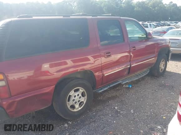 2003 Chevrolet Suburban LT with VIN 1GNEC16Z13J197680, listed as a IAAI auction lot 42558001 with Not provided miles and . Bid and sale history available at DreamBid. Image 6.
