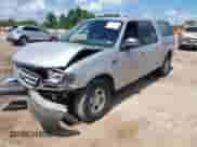 2002 Ford F-150 XLT with VIN 1FTRW07602KB73444, listed as a IAAI auction lot 42744286 with 208,152 mi miles and . Bid and sale history available at DreamBid. Image 2.