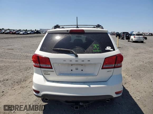 2014 Dodge Journey SXT with VIN 3C4PDDBGXET251543, listed as a Copart auction lot 63530895 with 107,709 mi miles and Salvage title. Bid and sale history available at DreamBid. Image 6.