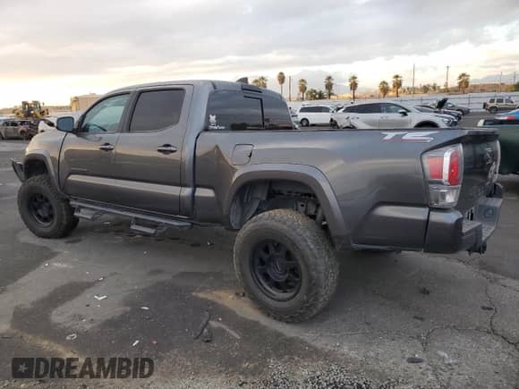 2021 Toyota Tacoma SR5 с VIN 3TMDZ5BN2MM108586, выставлен на аукционе Copart как лот 84925984 с пробегом 112 793 миль миль и Списание • Salvage title. История ставок и продаж доступна на DreamBid. Изображение 2.