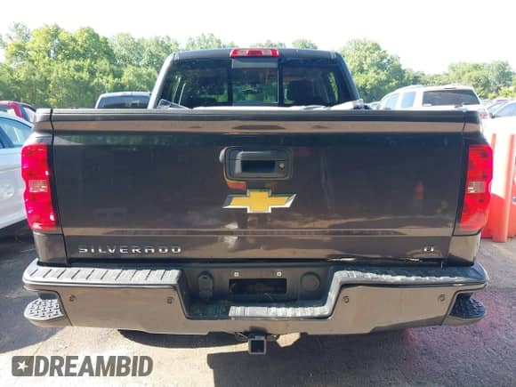 2016 Chevrolet Silverado 1500 LT with VIN 3GCUKRECXGG137939, listed as a IAAI auction lot 42653649 with 122,925 mi miles and . Bid and sale history available at DreamBid. Image 16.