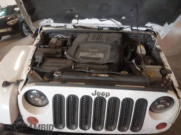 2012 Jeep Wrangler Arctic with VIN 1C4AJWBG9CL233232, listed as a IAAI auction lot 42282805 with 109,927 mi miles and . Bid and sale history available at DreamBid. Image 10.