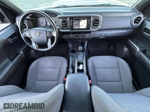 2017 Toyota Tacoma SR5 с VIN 3TMCZ5AN4HM091258, выставлен на аукционе Copart как лот 90036285 с пробегом 179 157 миль миль и Чистый • Clean title. История ставок и продаж доступна на DreamBid. Изображение 9.