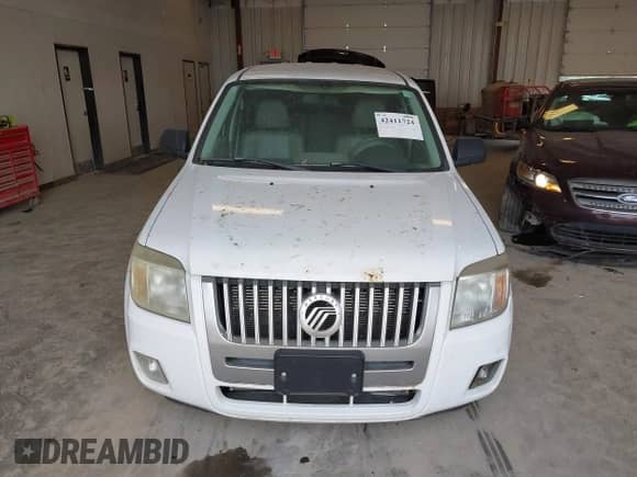 2008 Mercury Mariner with VIN 4M2CU91158KJ33778, listed as a IAAI auction lot 42411724 with 168,359 mi miles and . Bid and sale history available at DreamBid. Image 6.