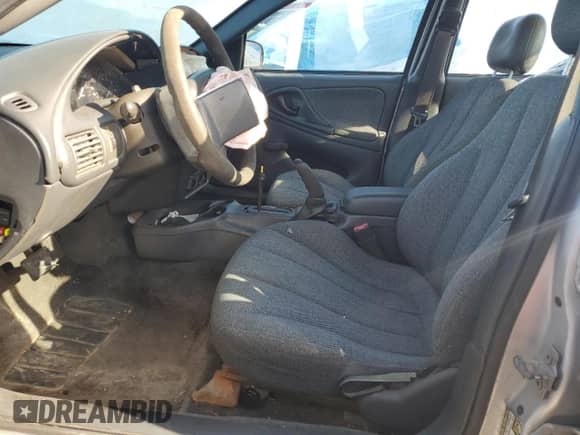 2005 Chevrolet Cavalier with VIN 1G1JC52F757148020, listed as a Copart auction lot 52108455 with 219,803 mi miles and Salvage title. Bid and sale history available at DreamBid. Image 7.