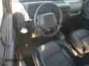 2000 Jeep Wrangler SE with VIN 1J4FA29P4YP775935, listed as a Copart auction lot 80458955 with 100,211 mi miles and Salvage title. Bid and sale history available at DreamBid. Image 8.