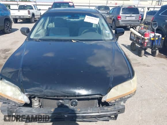 2002 Honda Accord SE z VIN 1HGCG66852A034121, wystawiony jako IAAI lot #42820792 z przebiegiem 220 120 mil mil oraz . Historia ofert i sprzedaży dostępna na DreamBid. Obrazek 13.