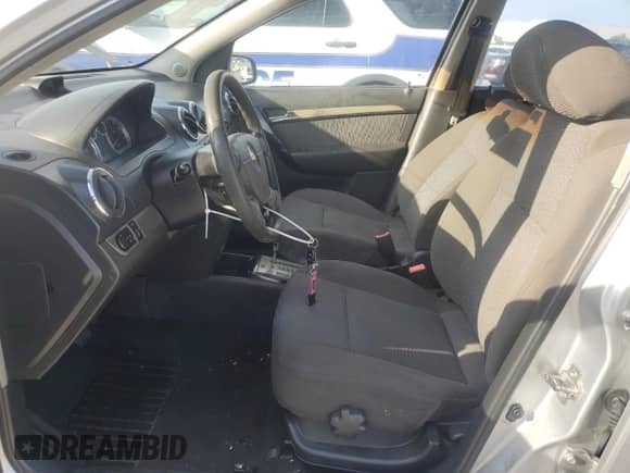 2007 Chevrolet Aveo LT z VIN KL1TG56687B158173, wystawiony jako Copart lot #66711975 z przebiegiem 157 695 mil mil oraz Szkoda całkowita • Salvage title. Historia ofert i sprzedaży dostępna na DreamBid. Obrazek 7.