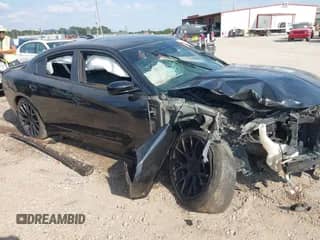 2015 Dodge Charger SXT with VIN 2C3CDXHG7FH768806, listed as a IAAI auction lot 43252419 with 224,950 mi miles and . Bid and sale history available at DreamBid. Image 1.