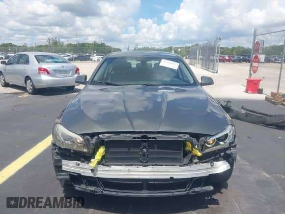 2014 BMW 5 Series 528i with VIN WBA5A5C51ED507090, listed as a IAAI auction lot 42584023 with 179,763 mi miles and . Bid and sale history available at DreamBid. Image 13.