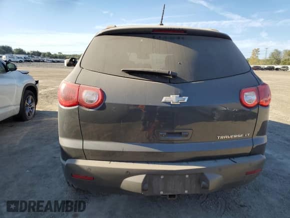 2011 Chevrolet Traverse 2LT z VIN 1GNKRJED5BJ113883, wystawiony jako Copart lot #71018725 z przebiegiem 211 554 mil mil oraz Szkoda całkowita • Salvage title. Historia ofert i sprzedaży dostępna na DreamBid. Obrazek 6.