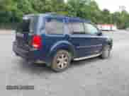 2009 Honda Pilot Touring with VIN 5FNYF48879B037564, listed as a IAAI auction lot 42683848 with 197,897 mi miles and . Bid and sale history available at DreamBid. Image 4.