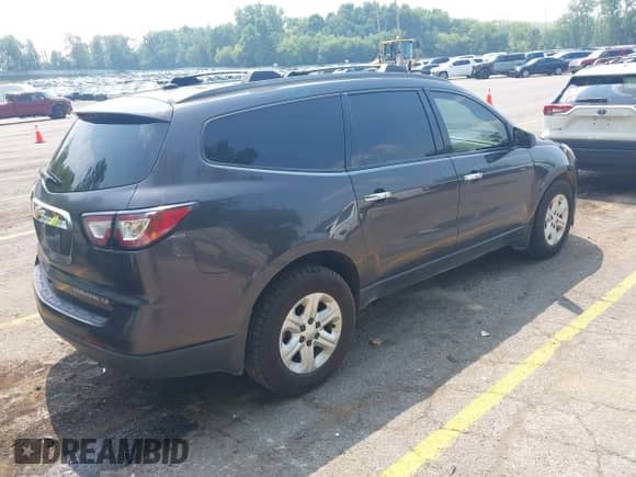 2014 Chevrolet Traverse LS z VIN 1GNKVFKD4EJ330942, wystawiony jako IAAI lot #42914223 z przebiegiem 216 999 mil mil oraz . Historia ofert i sprzedaży dostępna na DreamBid. Obrazek 4.