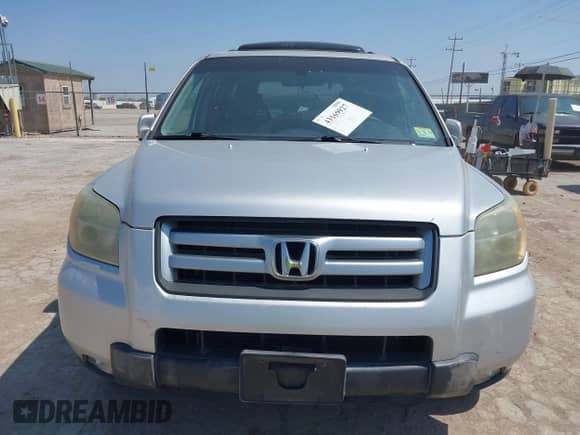 2006 Honda Pilot EX-L z VIN 5FNYF18656B009044, wystawiony jako IAAI lot #43169927 z przebiegiem 171 681 mil mil oraz . Historia ofert i sprzedaży dostępna na DreamBid. Obrazek 6.