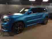 2014 Jeep Grand Cherokee SRT-8 z VIN 1C4RJFDJ0EC497826, wystawiony jako IAAI lot #38543666 z przebiegiem 79 937 mil mil oraz . Historia ofert i sprzedaży dostępna na DreamBid. Obrazek 2.