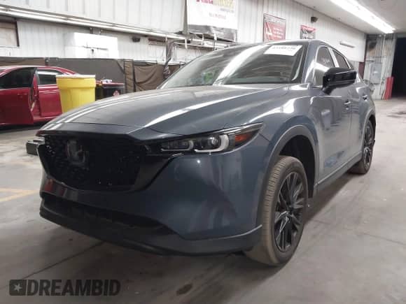 2023 Mazda CX-5 S Preferred z VIN JM3KFBCM3P0282220, wystawiony jako IAAI lot #43188220 z przebiegiem 29 080 mil mil oraz . Historia ofert i sprzedaży dostępna na DreamBid. Obrazek 2.