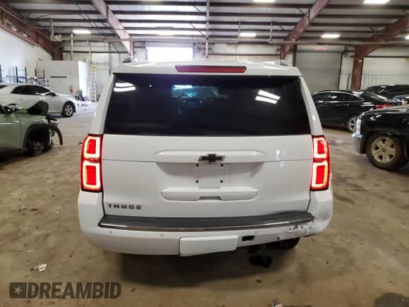 2015 Chevrolet Tahoe LTZ с VIN 1GNSKCKC3FR595045, выставлен на аукционе Copart как лот 64304845 с пробегом 150 535 миль миль и Чистый • Clean title. История ставок и продаж доступна на DreamBid. Изображение 6.